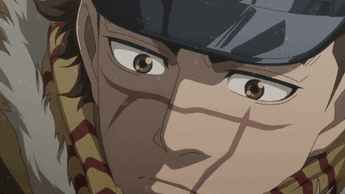 a close up of a man 's face wearing a hat