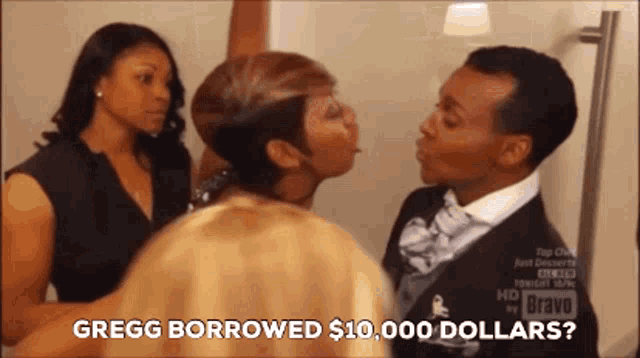 a woman kisses a man on the cheek and says gregg borrowed 10,000 dollars