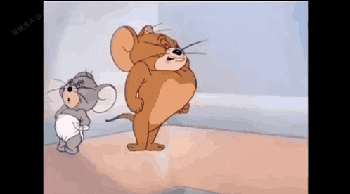 a cartoon of tom and jerry standing next to each other .