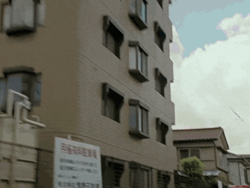 a building with a sign on the side that says ' emergency ' on it