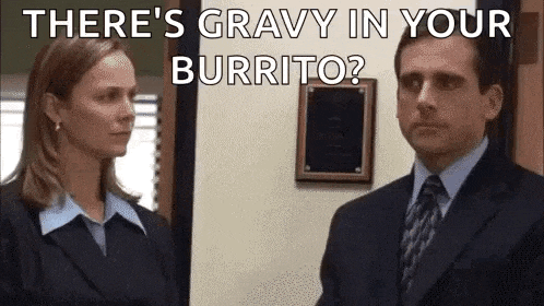 there is gravy in your burrito ? a man and a woman are standing next to each other in an office .