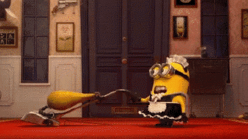 a yellow minion wearing a maid costume is vacuuming the floor