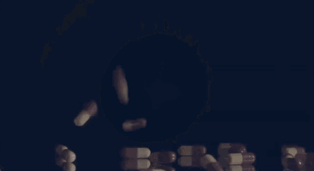a close up of a person 's eye with a dark circle in the middle