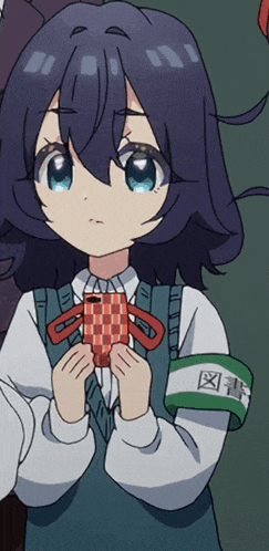 a girl in a school uniform has a green armband that says ' x ' on it