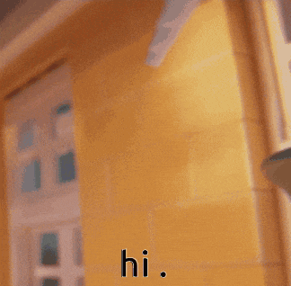 a close up of a cartoon character with the words hi written on it .