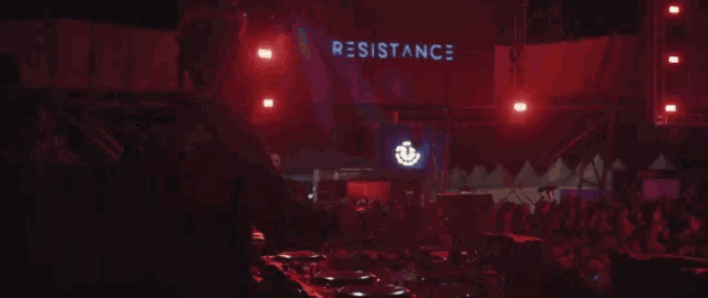 the word resistance is on a red sign