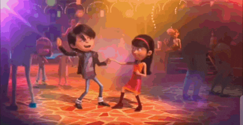 a boy and a girl are dancing on a dance floor in a club .
