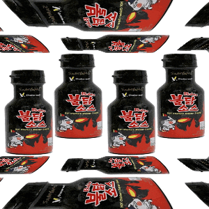 several bottles of korean hot sauce are lined up on a white surface