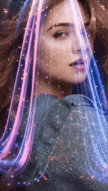 a woman with pink and blue hair covering her face with a blue veil