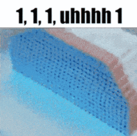 a close up of a blue item with the words 1 1 1 uhhh 1 below it