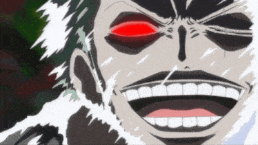 a close up of a man 's face with red eyes