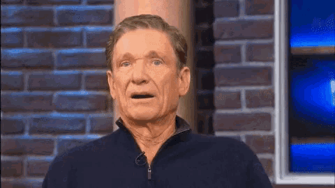 an older man with a surprised look on his face