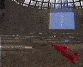 a computer monitor with a house on it is sitting on a bloody floor