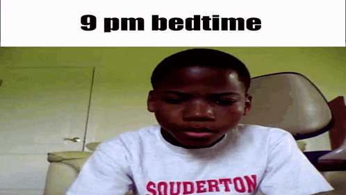 a boy wearing a shirt that says souderton
