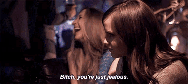 two women are sitting next to each other and one of them says bitch you 're just jealous