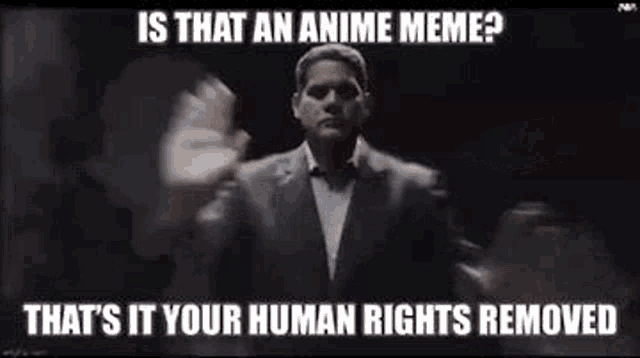 a man in a suit is standing in front of a black background with a meme .