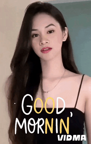 a woman in a black tank top with the words good mornin vidma written on it