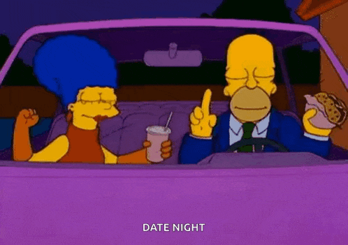 homer simpson is driving a car with marge simpson sitting in the back seat .