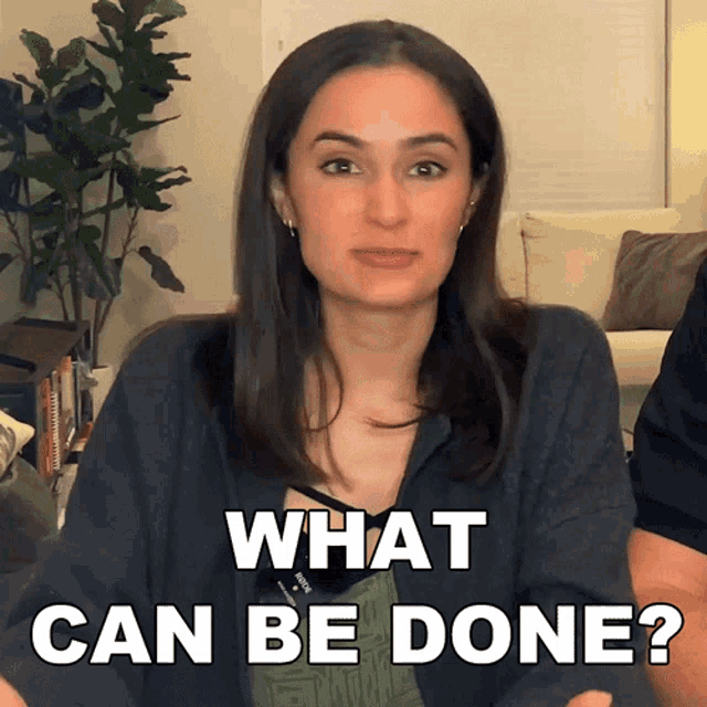 a woman says what can be done in front of a couch