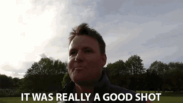 a man says it was really a good shot in front of a field