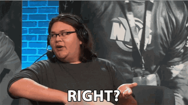 a man wearing a headset says right