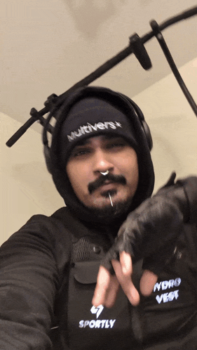 a man wearing a hat that says multiverse