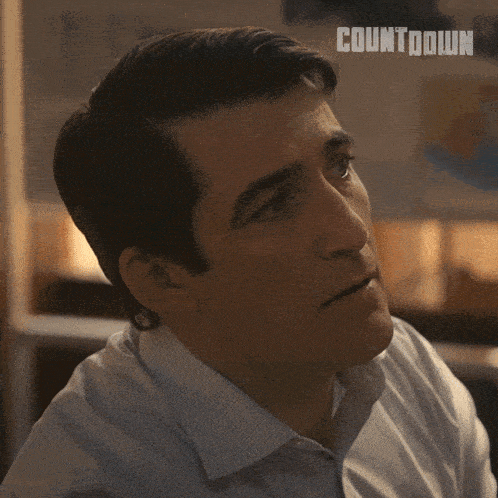 a man says keep on going with a countdown logo behind him