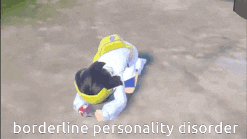 a video game character is laying on the ground with the words borderline personality disorder written above him .