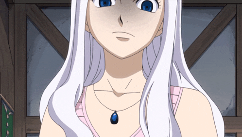a girl with white hair and a necklace with a blue stone