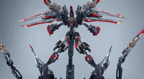a robot with a lot of arms and weapons on it