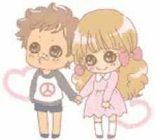 a boy and a girl are holding hands in front of a heart .