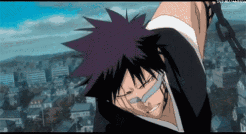 a man with purple hair is wearing glasses and a bandage around his mouth .