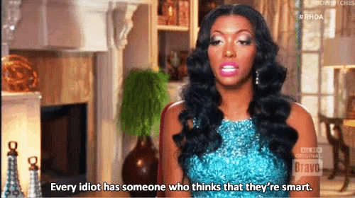 a woman in a blue dress says every idiot has someone who thinks that they 're smart