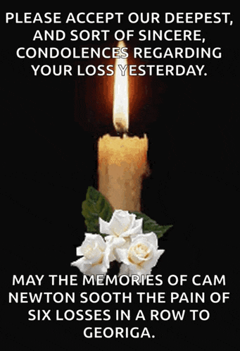 a picture of a candle with white roses and a quote