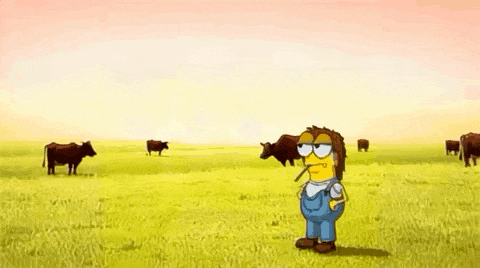 a cartoon character is standing in a field with cows and smoking a cigarette .