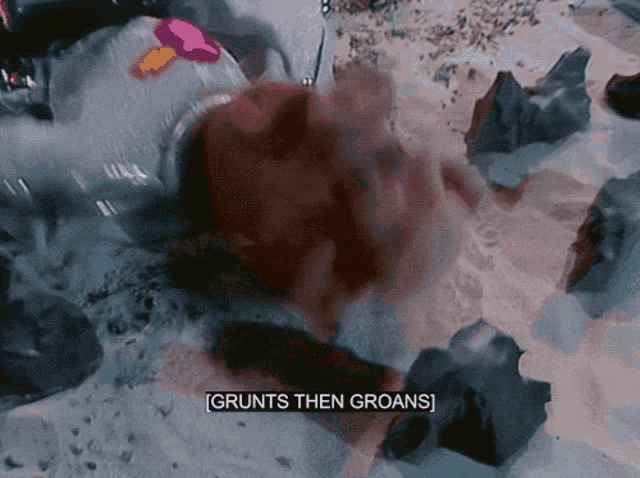 a person laying on the ground with the words " grunts then groans " written below them