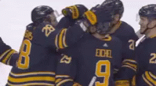 Buffalo Sabres Ice Hockey GIF - Buffalo Sabres Ice Hockey Group Hug GIFs