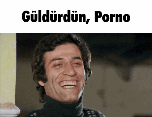 a man in a black turtleneck is laughing with the words güldürdün porno behind him