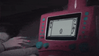 a pink device with the words hey on it