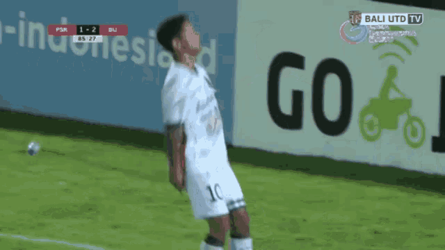 a soccer player with the number 10 on their jersey