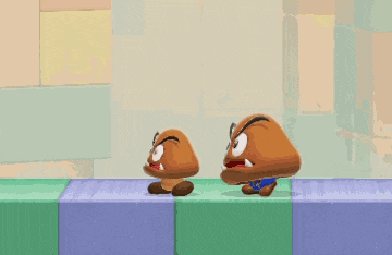 two cartoon characters are standing next to each other on a blue and green block .