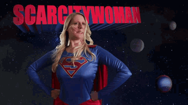 a woman in a superman costume stands in front of a scarcity woman logo
