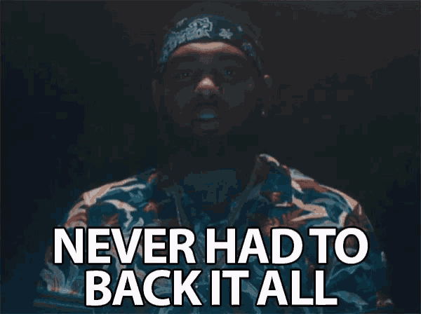 a man with a bandana on his head is saying " never had to back it all "