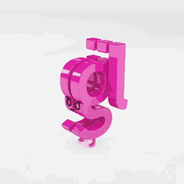 a 3d rendering of the letter g with a face on it
