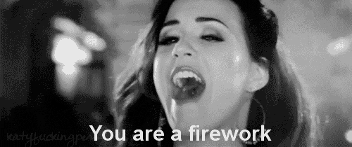 a black and white photo of a woman with her mouth open and the words you are a firework .