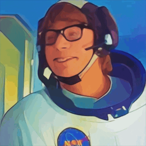 a man wearing glasses and a nasa logo on his chest