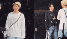 two men are standing next to each other on a stage . one of the men is wearing a hat .