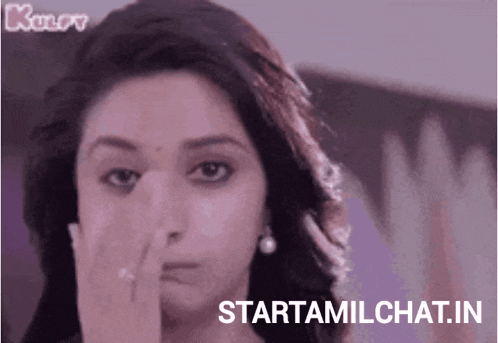 a close up of a woman 's face and the words starttamilchat.in