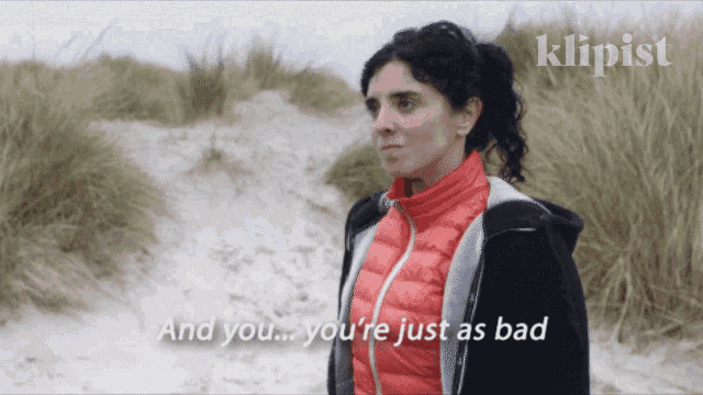 a woman in a red jacket says " and you ... you 're just as bad " in a klipist ad