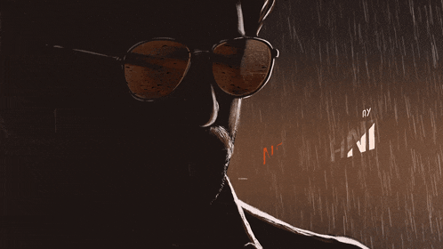 a poster for nani x sujeeth with a man wearing sunglasses